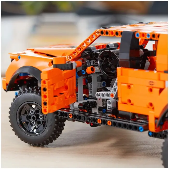 Lego raptor truck on sale